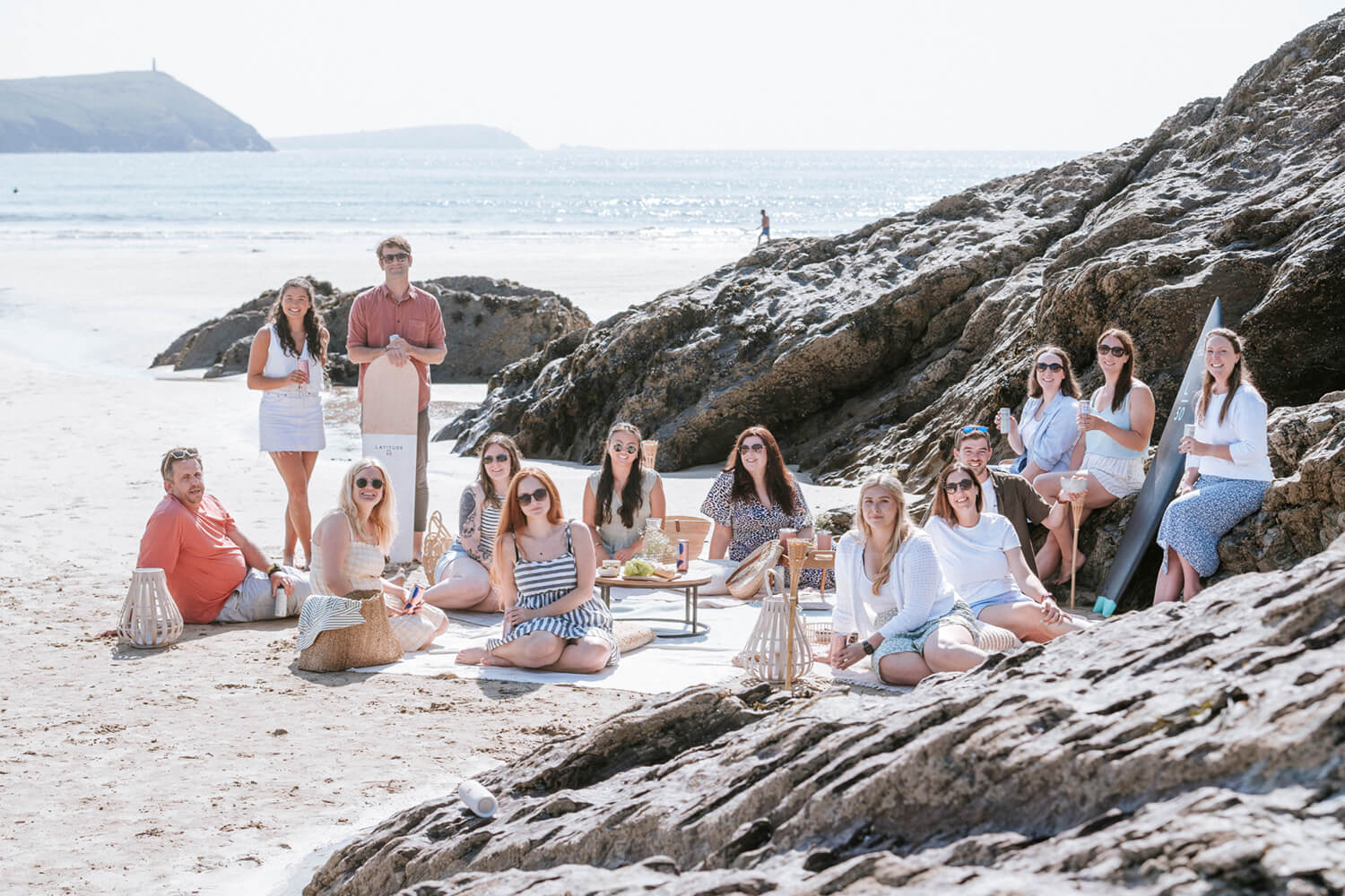 The Latitude50 team enjoying a picnic on a Cornish beach.