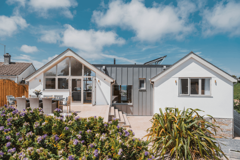 A sunny exterior image of The Retreat in Polzeath.