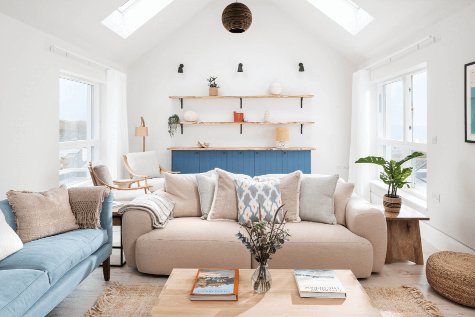 A comfortable and contemporary living space in neutral, pastel shades.
