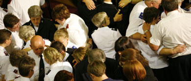 Salvationists praying