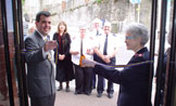 Man and Women opening a new 

centre