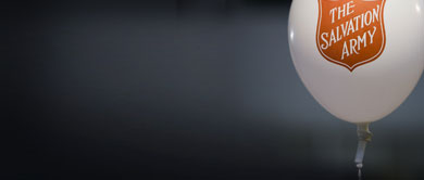 Salvation Army balloon on a dark background