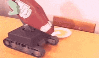 Robot spilling ketchup.