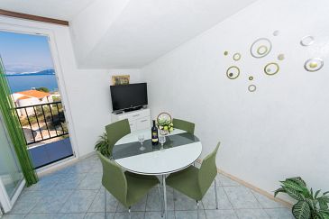 Dining room Slatine, Dining room u smještaju tipa apartment, dostupna klima, dopusteni kucni ljubimci i WIFI.