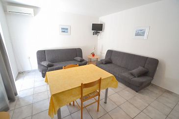 Jídelna Novigrad, Jídelna u smještaju tipa apartment, dostupna klima, dopusteni kucni ljubimci i WIFI.