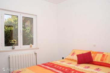 Bedroom Račišće, Bedroom u smještaju tipa studio-apartment.