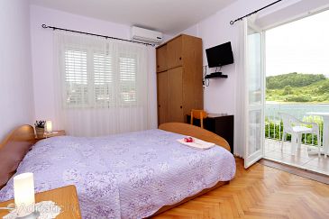 Bedroom Lumbarda, Bedroom u smještaju tipa room, dostupna klima i WIFI.