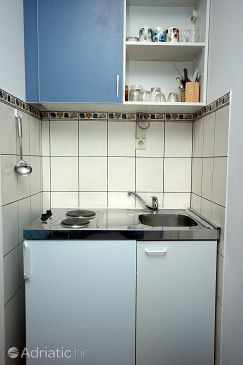 Kitchen Mlini, Kitchen u smještaju tipa studio-apartment.