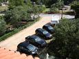 Parking lot - Rooms 5047 Parking lot Banjol (Rab) - Accommodation 5047 - Rooms near sea with sandy beach.
