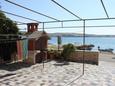 Courtyard - Rooms 6288 Courtyard Kustići (Pag) - Accommodation 6288 - Rooms near sea with pebble beach.