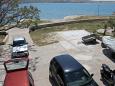 Parking lot - Apartments 6355 Parking lot Kustići (Pag) - Accommodation 6355 - Apartments near sea with pebble beach.