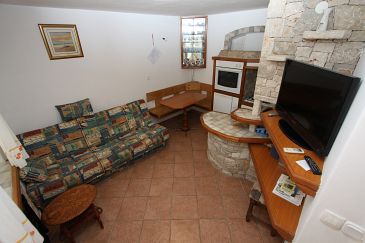 Dining room Bašanija, Dining room u smještaju tipa apartment, dostupna klima, dopusteni kucni ljubimci i WIFI.