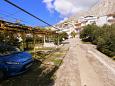Parking lot Duće, Omiš, Parking lot 7576 - Apartments blizu mora with sandy beach.