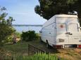 Parking lot Zavala, Hvar, Parking lot 8706 - Apartments with pebble beach.