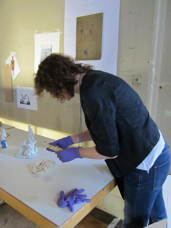 Charlotte Hubbard, the Conservation Department liaison for Europe 1600-1800, examining a small ivory snuff rasp