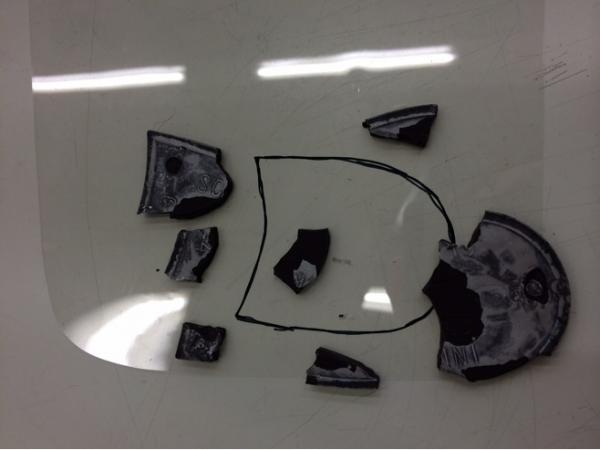 A tracing of the shape of the sole was taken to help fit the pieces together.