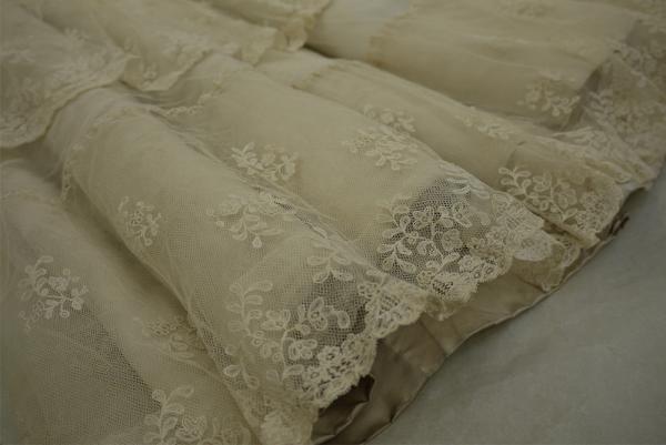 Photograph of the cleaned hem of the wedding dress