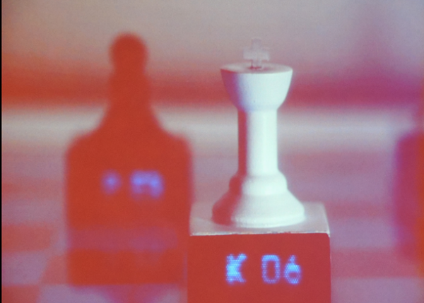3d-printed interactive chess pieces on a Microsoft Surface chessboard