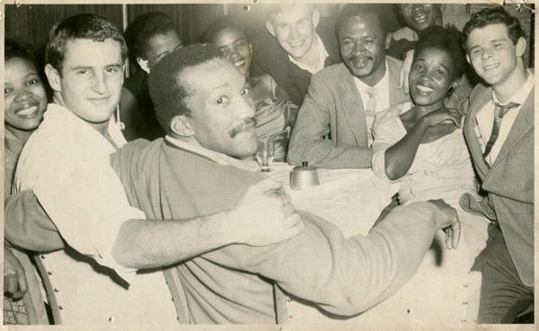 An illegal gathering in S.A. in the late 50s. The Xhosa princess and Ian side by side – years ahead of their time at a Shebeen party in Woodstock. © Ian Rakoff An illegal gathering in S.A. in the late 50s. The Xhosa princess and Ian side by side – years ahead of their time at a Shebeen party in Woodstock. © Ian Rakoff