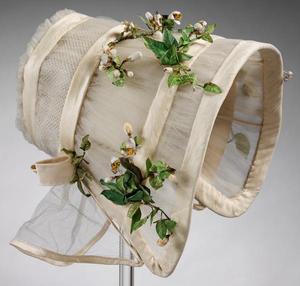 Wedding bonnet made of silk tulle, crêpe, and imitation orange blossom, 1845. © Victoria and Albert Museum, London Wedding bonnet made of silk tulle, crêpe, and imitation orange blossom, 1845. © Victoria and Albert Museum, London