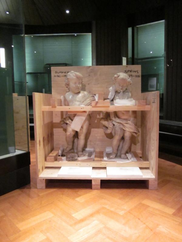 Two French 18th century marble statuettes in the process of being crated