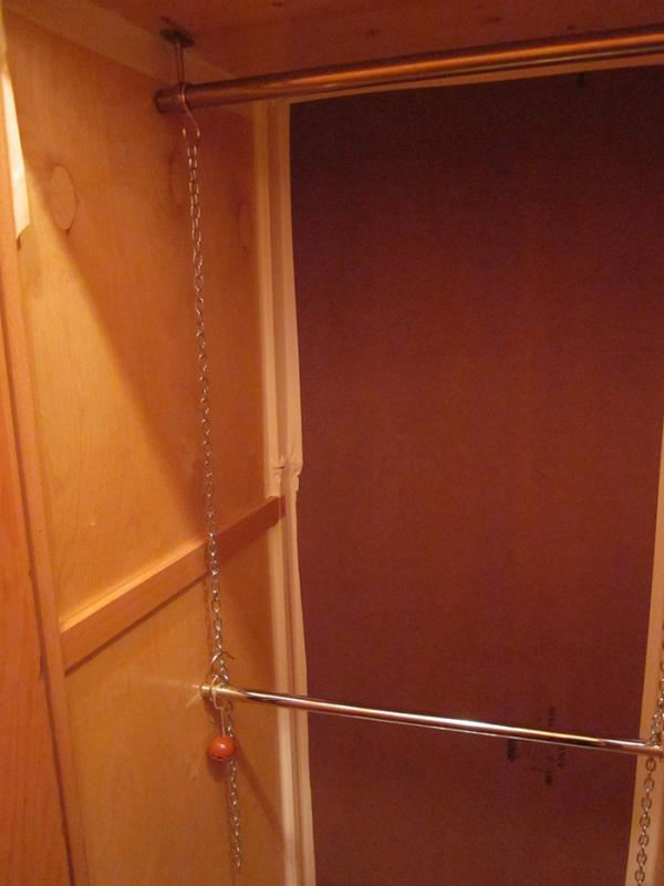 The confined space of a menswear store cupboard