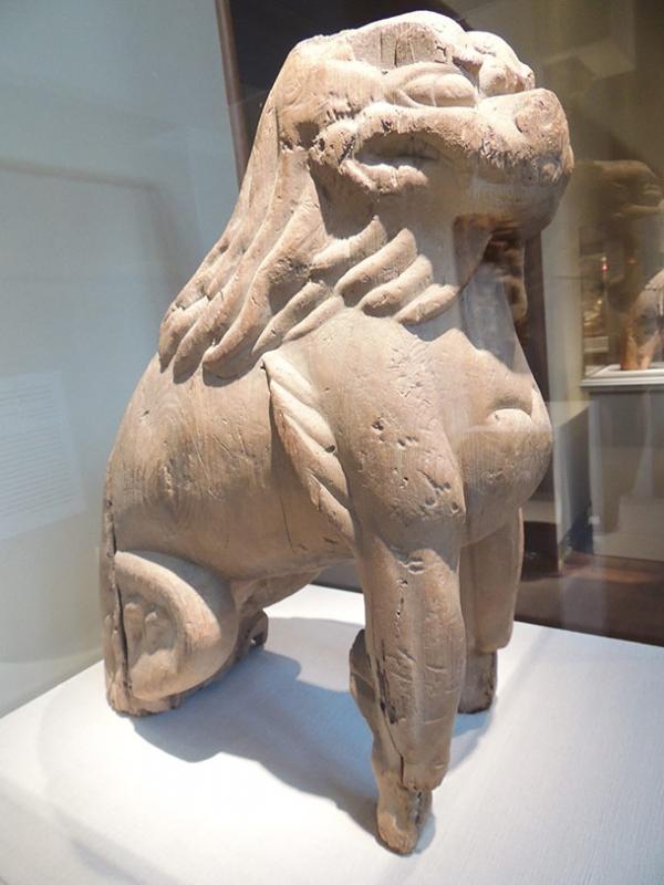 Carved wooden lion-dog figure in Portland Art Museum