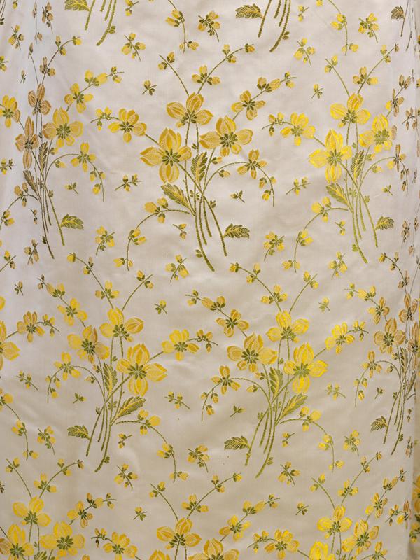 Buttercup print satin curtain material used for Elizabeth King’s wedding dress, 1941. © Victoria and Albert Museum, London Buttercup print satin curtain material used for Elizabeth King’s wedding dress, 1941. © Victoria and Albert Museum, London