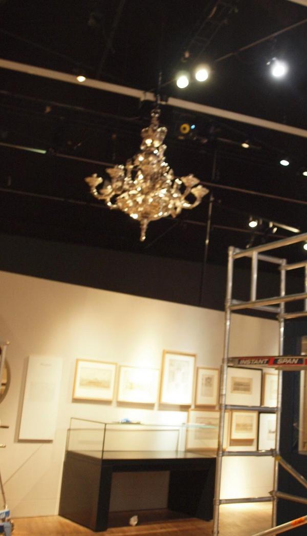 Look Mum, no hands! The chandelier is finally in place.