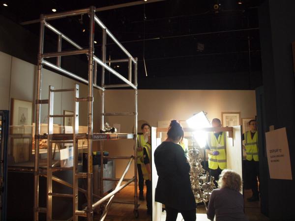 The courier and conservator check the object to make sure it hasn't sustained any injuries during transit.