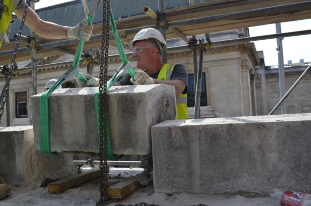 Expert stonemasons carefully removing the Aston Webb Screen for construction. The stones are currently in safe storage until their re-installation in 2016, 2012 © Victoria and Albert Museum, London