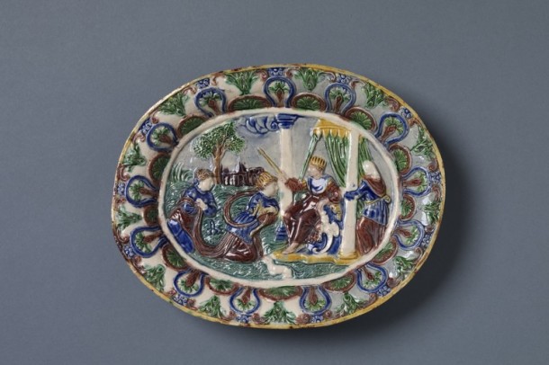 Buff earthenware with moulded decoration in low relief and decorated with coloured glazes. Depicitng the Old Testament story of Queen Esther before King Ahasuerus, French, about 1600. V&A 1795-1855