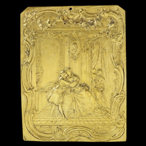 Gilded copper alloy plaque depicting a love scene after an illustration by F. Boucher. Plaque signed and dated by 'P Suther', Paris, 1748. V&A M.310-1919