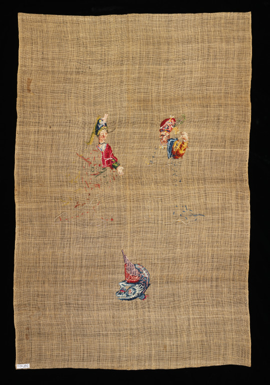 Shot showing the back of an unfinished panel of needlework. It was partially embroidered with wool and silk threads, in tent stitch, on linen canvas, France (probably), ca.1720-50 V&A T.131-2012