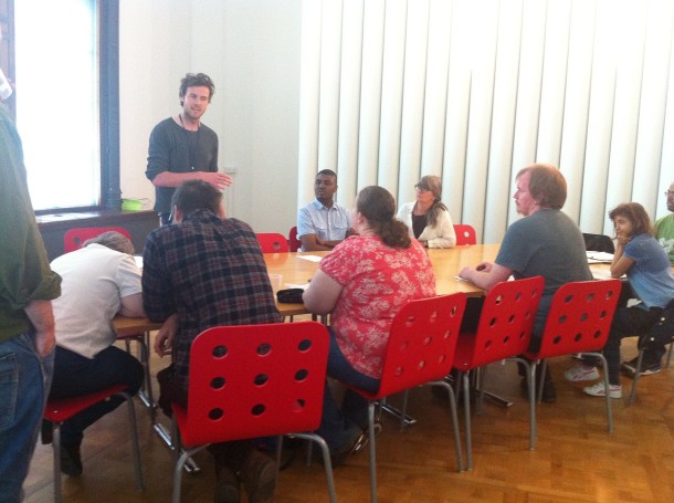 Liam talks to the Intoart group about his work related to the Exhibiton Road construction site. © Victoria and Albert Museum, London