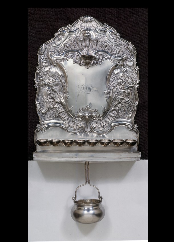 Hanukkah Lamp; silver. Height 39 cm, Width 25 cm The Victoria and Albert Museum, given by Miss Gladys Abecassis. Museum no. M.75&A-1949