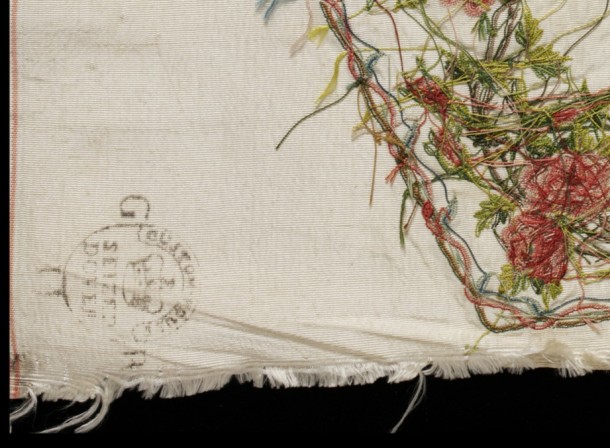 Customs stamp on a contraband waistcoat shape of embroidered ribbed silk, France, 1750-1759. V&A T.12A-1981 The stamp reads ‘Custom House / SEIZED DOVER / GR II’