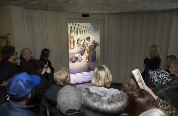 Cast members viewing the film The Masquerade