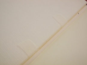 Case bound book with tapes under endpaper