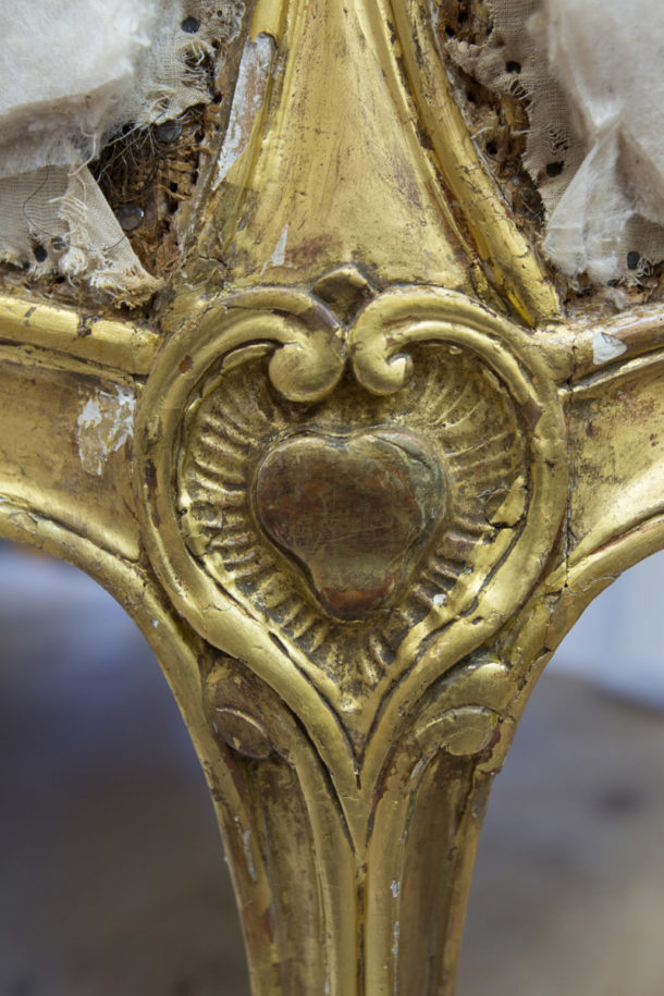Before treatment detail of sculptural ornament on daybed