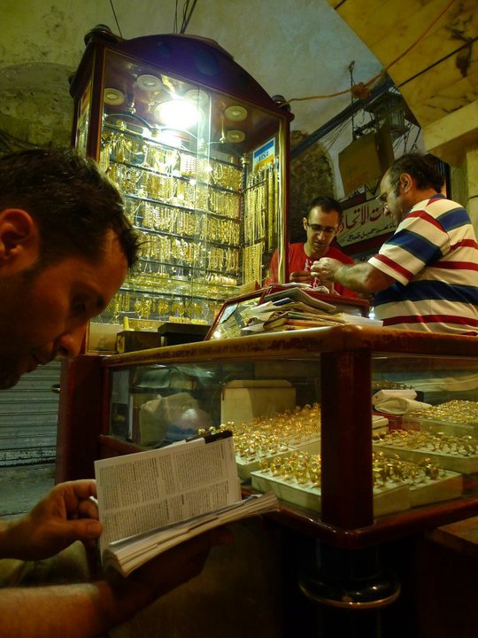 Victor (seated on the left) in the gold shop where he purchased the pendant from the Armenian goldsmiths in Aleppo. © Victor Borges