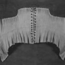 Woven corset, Charles Bayer, Britain, London, 1879-85. Linen, silk and whalebone (baleen), V&A: T.114&A-1938.