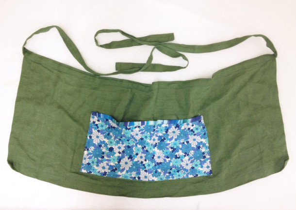 Apron worn to de-install The Glamour of Italian Fashion 1945-2014. Photograph © Sadie Hough, 2014