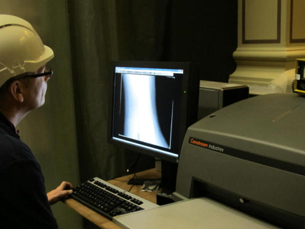 Andy Saunders from Intertek NDT analyses the digital images on a computer screen.