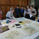 Hanne Faurby with Eveline Gordon embroidery samples © Victoria and Albert Museum, London