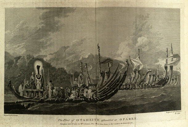 View of Tahitian boats showing islanders wearing ceremonial dress