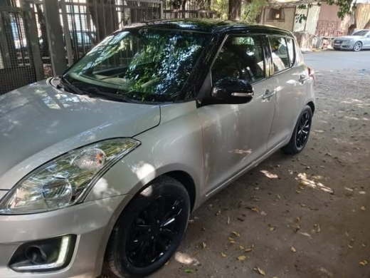 Suzuki Swift GLX 2016 Silver with Black Roof and Rims — 2