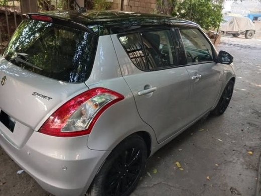 Suzuki Swift GLX 2016 Silver with Black Roof and Rims — 4