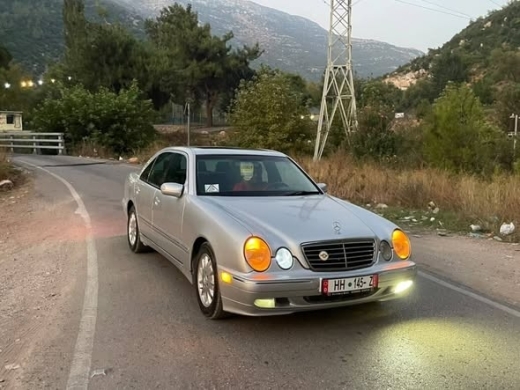 2001 Silver Mercedes-Benz V320 with Black Leather Interior