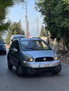 Two Automatic Cars: 2001 Volkswagen and 2013 Gely